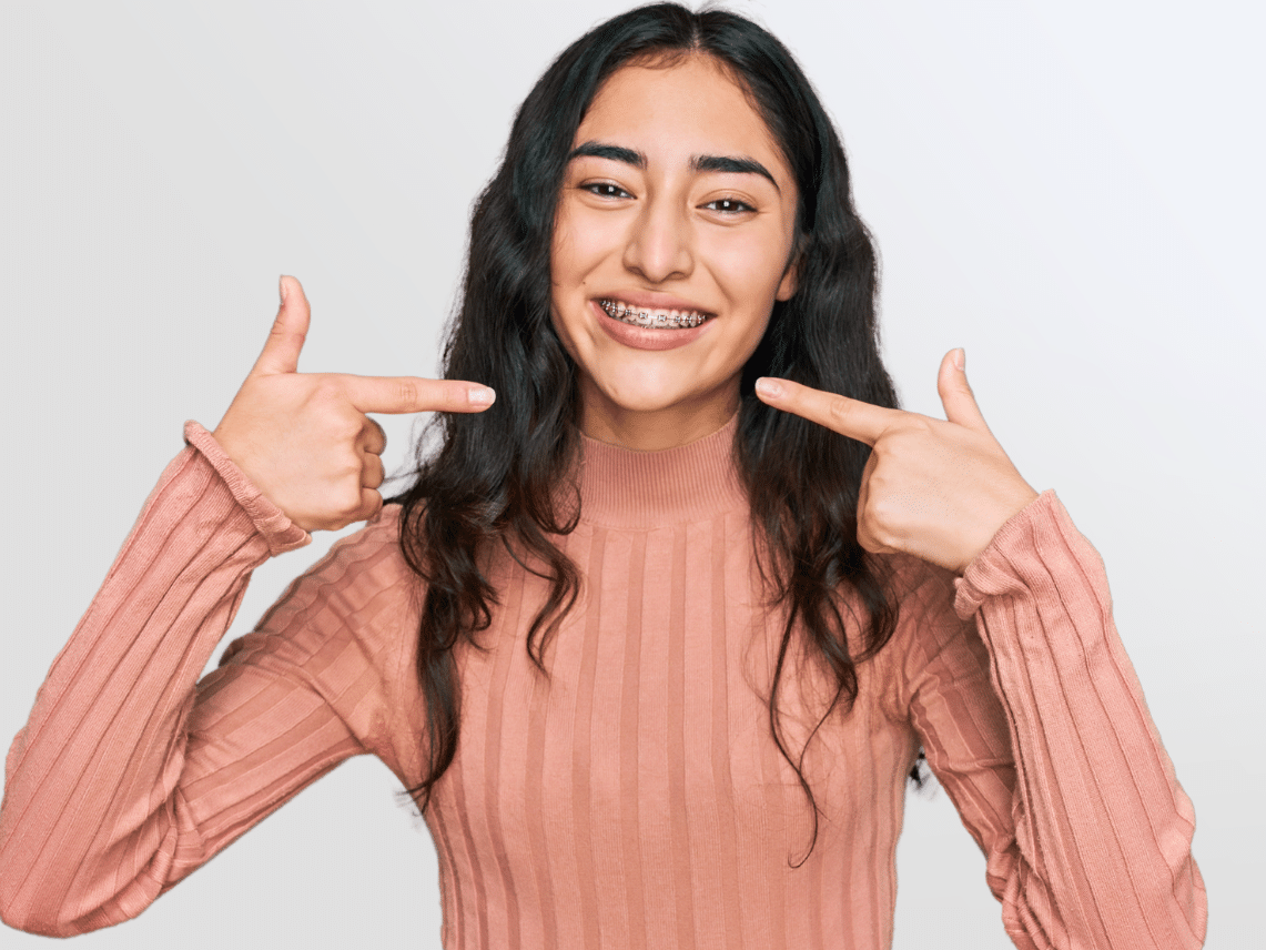 Teen with braces Ossa Orthodontics in Caldwell, OH